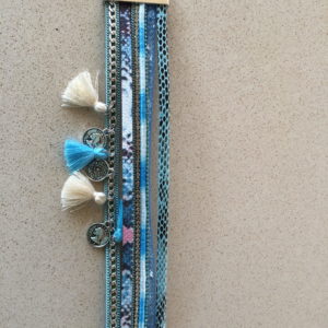 Turquoise blue bracelet pompoms